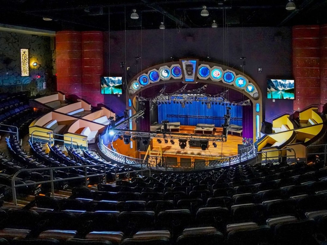 The Bourbon Room proscenium at Showboat Hotel Atlantic City, lit with seven stained-glass panels